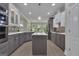 Spacious kitchen featuring an island, stainless steel appliances, modern lighting, and gray cabinetry at 285 Acton Dr, Fayetteville, GA 30215