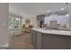 Open kitchen with island, stainless appliances, and a breakfast nook at 285 Acton Dr, Fayetteville, GA 30215