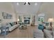 Spacious living room with fireplace, high ceilings, and ample seating for entertaining guests at 285 Acton Dr, Fayetteville, GA 30215