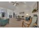 Cozy living room featuring hardwood floors, comfortable seating, and views into other rooms at 285 Acton Dr, Fayetteville, GA 30215