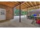 Open patio with exposed wood framing and concrete flooring, perfect for outdoor projects at 285 Acton Dr, Fayetteville, GA 30215