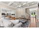 Inviting living room featuring a coffered ceiling and access to a staircase at 195 Berry Hill Ln, Tyrone, GA 30290