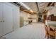 Unfinished basement space featuring storage and utilities at 2400 White Pine Ln, Mansfield, GA 30055
