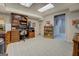Basement featuring a built-in desk and cabinets, offering a functional workspace or home office area at 2400 White Pine Ln, Mansfield, GA 30055