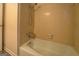 A bathroom showcasing a bathtub and shower combination, great for a quick shower or relaxing bath at 2400 White Pine Ln, Mansfield, GA 30055