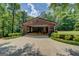 A detached garage provides ample parking and storage space, enhancing the convenience of this property at 2400 White Pine Ln, Mansfield, GA 30055