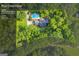 Aerial view of property with pool, home and lot size of 1.37 acres at 603 Lakewood Dr, Social Circle GA 30025 at 603 Lakewood Dr, Social Circle, GA 30025
