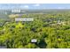 A quiet home nestled amongst dense trees is conveniently located near Social Circle High School and Alcova Drive at 603 Lakewood Dr, Social Circle, GA 30025