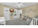 Bright Bedroom with ample storage, changing table and comfortable rocking chair at 603 Lakewood Dr, Social Circle, GA 30025