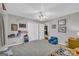 Neutral bedroom features a toddler bed, carpeting, and ample storage at 603 Lakewood Dr, Social Circle, GA 30025