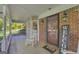Spacious covered front porch with brick accents and ample room for seating, perfect for outdoor enjoyment at 603 Lakewood Dr, Social Circle, GA 30025