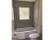 Updated bathroom with a tiled shower and new fixtures at 90 Pat Mell Sw Rd, Marietta, GA 30060