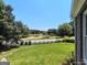 Expansive backyard featuring lush green lawn and a picturesque view of the surrounding landscape at 1292 Hidden Spirit Trl, Lawrenceville, GA 30045