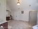 Bright, airy bathroom with tiled floor, glass shower, and spacious vanity at 1292 Hidden Spirit Trl, Lawrenceville, GA 30045