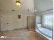 Bright bathroom featuring a soaking tub and a separate shower with glass doors at 1292 Hidden Spirit Trl, Lawrenceville, GA 30045