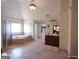 Large bathroom with a soaking tub, tiled floors, and separate vanities at 1292 Hidden Spirit Trl, Lawrenceville, GA 30045