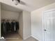 Walk-in closet featuring shelving and hanging storage at 1292 Hidden Spirit Trl, Lawrenceville, GA 30045