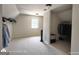 Spacious walk-in closet featuring built-in shelving, plenty of hanging storage, and a window at 1292 Hidden Spirit Trl, Lawrenceville, GA 30045