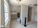 Bedroom walk-in closet with shelving and rack for ample storage and natural light from a large window at 1292 Hidden Spirit Trl, Lawrenceville, GA 30045