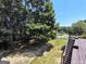 Wooden deck overlooking a wooded area, perfect for outdoor relaxation and enjoying nature at 1292 Hidden Spirit Trl, Lawrenceville, GA 30045