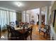 Bright dining room featuring hardwood floors, and classic furnishings at 1292 Hidden Spirit Trl, Lawrenceville, GA 30045