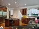 Bright kitchen featuring a large island, stainless steel appliances, and hardwood floors at 1292 Hidden Spirit Trl, Lawrenceville, GA 30045
