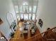 Grand living room with high ceilings, many windows and a fireplace at 1292 Hidden Spirit Trl, Lawrenceville, GA 30045