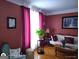 Cozy living room features hardwood floors, natural light, comfortable seating, and elegant decor at 1292 Hidden Spirit Trl, Lawrenceville, GA 30045