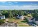 Aerial view showcasing the home's spacious lot and its location in a quiet, wooded neighborhood at 609 Alyssa Ct, Locust Grove, GA 30248