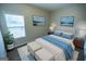 Stylishly furnished bedroom features a plush bed, neutral walls and matching bedside tables with lamps at 609 Alyssa Ct, Locust Grove, GA 30248