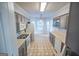 Functional kitchen featuring plenty of counter space and a view of the bright breakfast area at 609 Alyssa Ct, Locust Grove, GA 30248