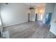 Bright and airy living room featuring modern flooring and a neutral color palette at 609 Alyssa Ct, Locust Grove, GA 30248