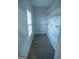 Walk-in closet featuring adjustable shelving and a window at 609 Alyssa Ct, Locust Grove, GA 30248