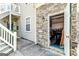 Attached garage with open door showing storage, accessed from exterior at 512 Las Brasis Ct, Peachtree City, GA 30269