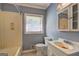 Modest bathroom features a window and vanity with storage at 2742 Highway 20 W, Hampton, GA 30228