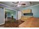Bonus room with hardwood floors and lots of storage adjoins a Gathering room at 2742 Highway 20 W, Hampton, GA 30228