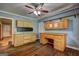 Spacious bonus room features hardwood floors and custom cabinetry at 2742 Highway 20 W, Hampton, GA 30228