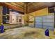 Open garage area with unfinished walls and concrete floor at 2742 Highway 20 W, Hampton, GA 30228