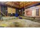 Unfinished garage needs TLC, has stone foundation and plywood walls at 2742 Highway 20 W, Hampton, GA 30228
