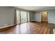 Inviting living room featuring gleaming hardwood floors and lots of natural light at 2742 Highway 20 W, Hampton, GA 30228