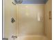 This shower features dated tile, and classic fixtures at 2742 Highway 20 W, Hampton, GA 30228