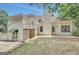 Exterior view of home featuring a deck, yard, and covered patio at 70 N Strathmore Dr, Sharpsburg, GA 30277