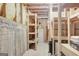 Unfinished basement with shelving units perfect for storage at 70 N Strathmore Dr, Sharpsburg, GA 30277