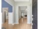 Inviting foyer features hardwood floors, gray walls and provides an entryway into the home at 70 N Strathmore Dr, Sharpsburg, GA 30277