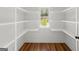Walk-in pantry with shelving and window at 4585 Parkwood Rd, Social Circle, GA 30025