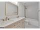Modern bathroom with double vanity and tiled shower/tub at 1834 Stroud Road, Mcdonough, GA 30252