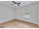 Bedroom with lots of natural light and ceiling fan at 1834 Stroud Road, Mcdonough, GA 30252