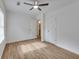 Bright bedroom featuring modern ceiling fan and view of bathroom at 1834 Stroud Road, Mcdonough, GA 30252