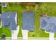Overhead view of house between two other properties surrounded by green lawns at 328 Brookstone Dr, Carrollton, GA 30116