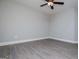 Empty bedroom featuring new, neutral paint and wood-look flooring at 328 Brookstone Dr, Carrollton, GA 30116